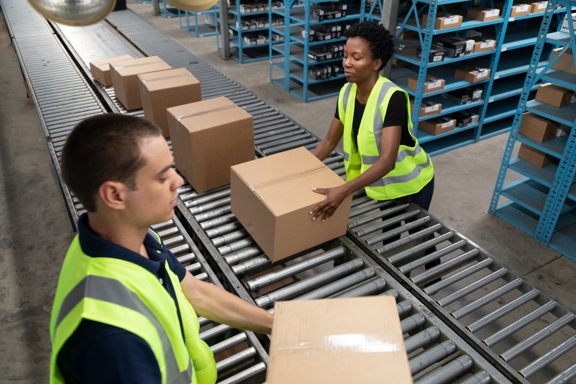 Conveyor Belt and Warehouse Workers